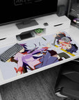 40x20 inches Monogatari desk pad featuring Hitagi Senjougahara and Koyomi Araragi amid scissors and pencils.