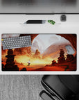 32x16 inches anime mouse pad in warm orange and dusty gold, dreamy desert glow with soft planets overhead.