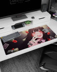 Black-haired anime girl desk pad 36x16 inches, grinning with a card at her lips amid chips and dice.