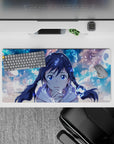 32x16 inches anime desk mat in soft sky blues with dreamy clouds and a calm, magical cozy glow.