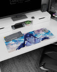 32x12 inches desk mouse pad showing a cute anime girl leaning in to cheer you on, with floating runes.