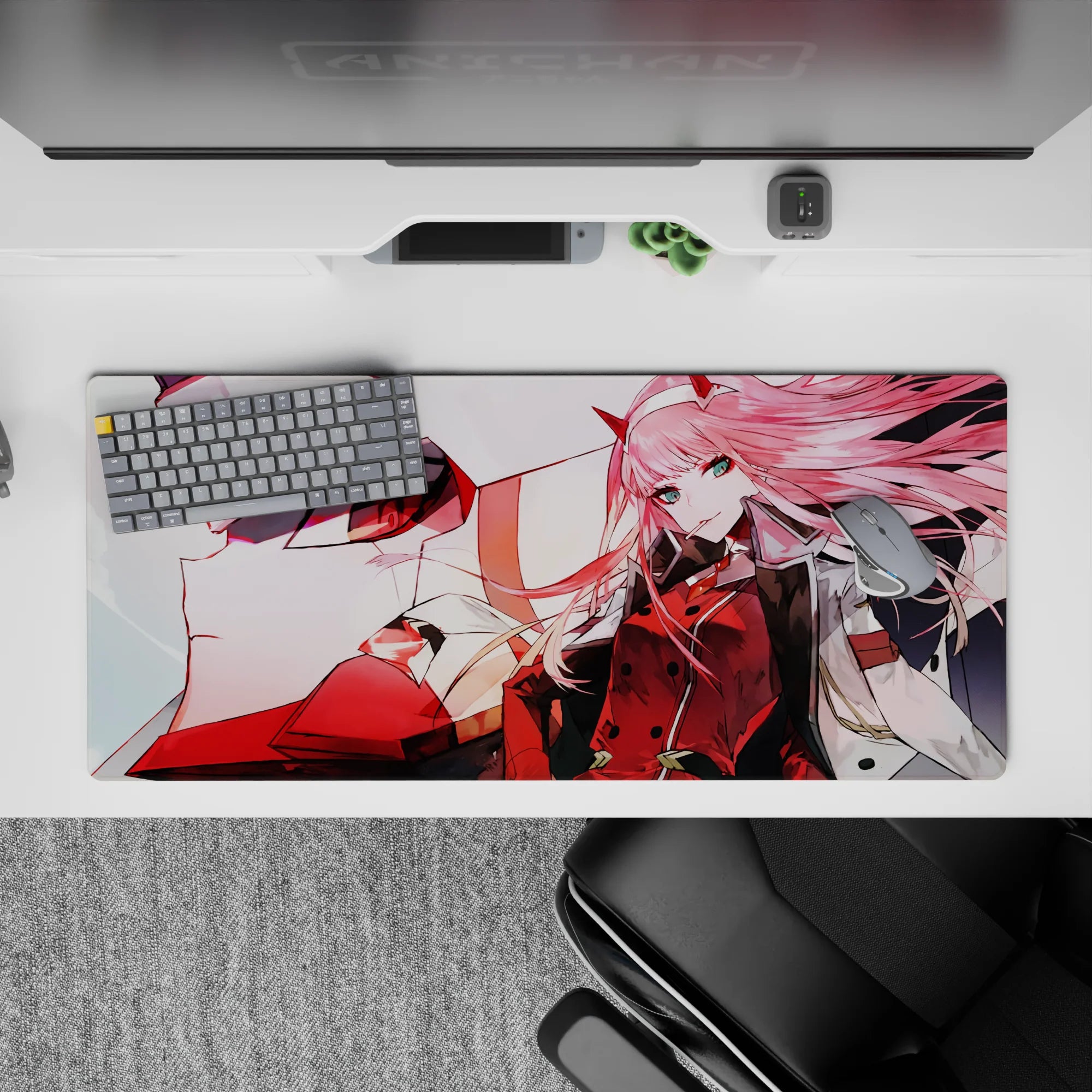 Striking 36x16 desk pad highlights Zero Two's fierce energy and mecha's dominance with vivid details