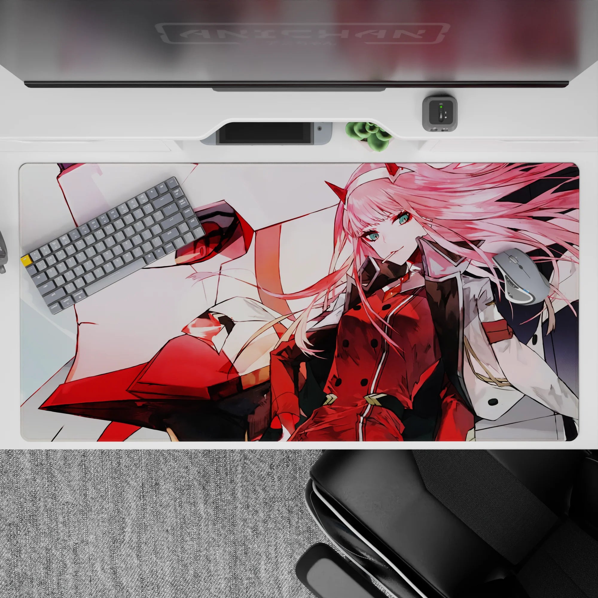 Powerful 40x20 desk pad showcases Zero Two and her towering mecha for fans of raw power and loyalty