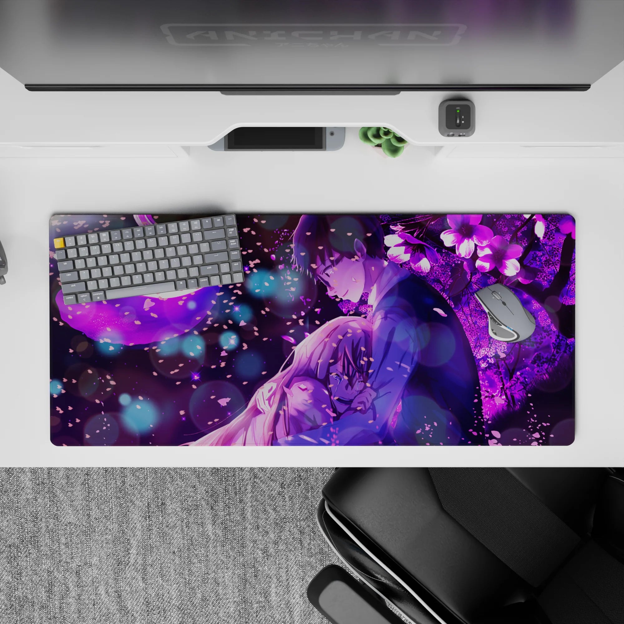 36x16 inches anime desk pad in rich violet tones, dreamy late-night romance vibe with soft glow and flowers.