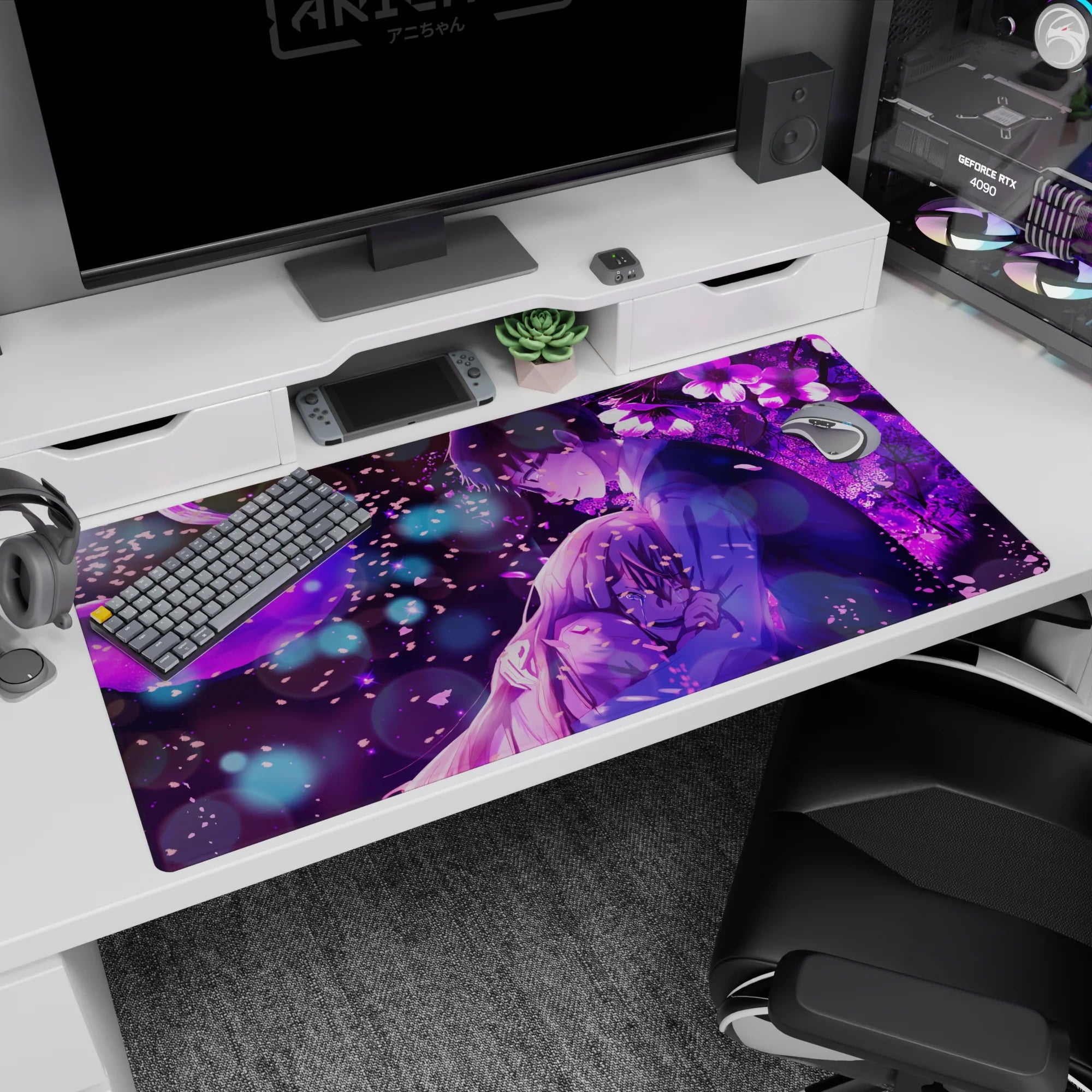 Dark-haired boy hugs tearful girl under petals and crescent moon on anime desk pad 40x20 inches.