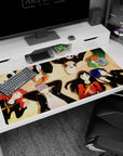 Persona 4 Golden desk pad 40x20 inches featuring Yukiko, Chie, Naoto, Yu, and Rise under soft golden light.