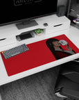 36x16 inches Yumeko Jabami desk pad in crimson blazer, side glance smile, and playful peace sign.