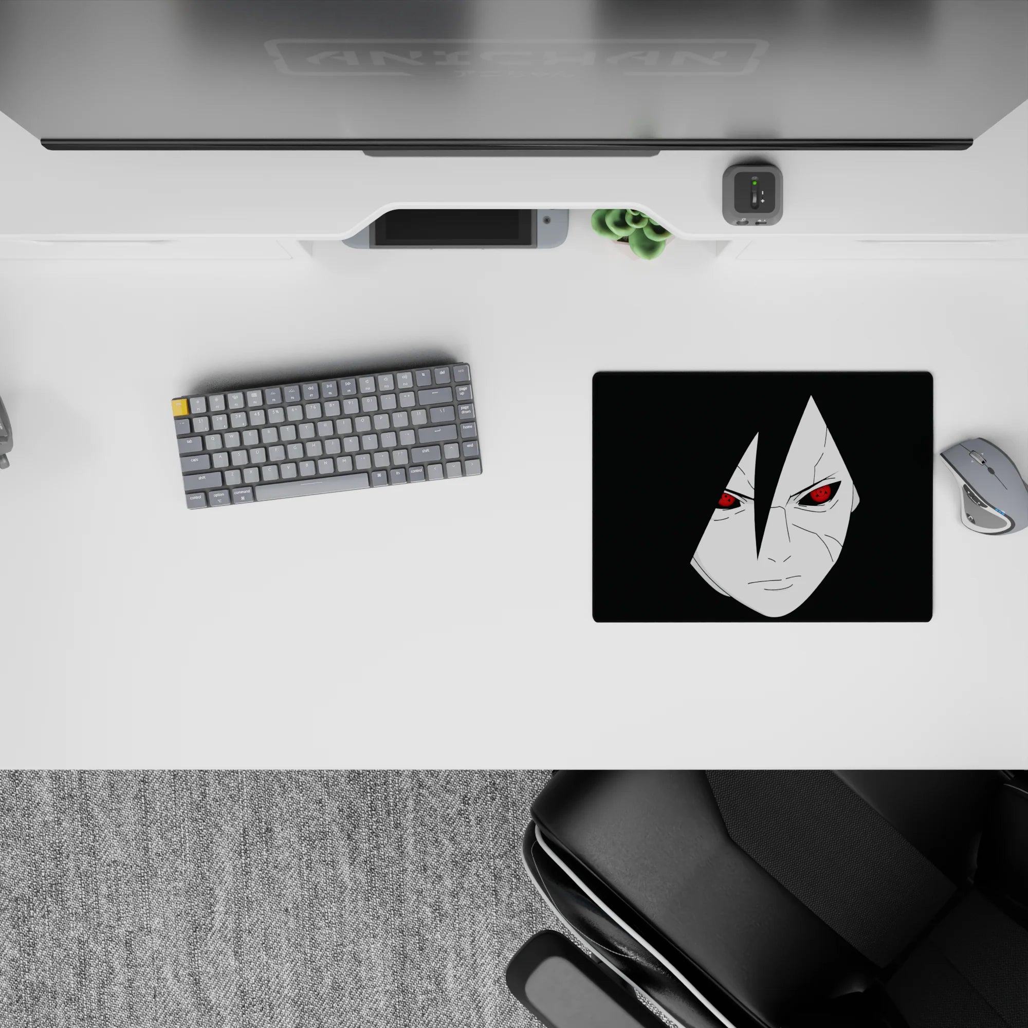 Moody black anime mouse pad 14x10 inches with pale portrait and red Sharingan eyes, sleek midnight vibe.