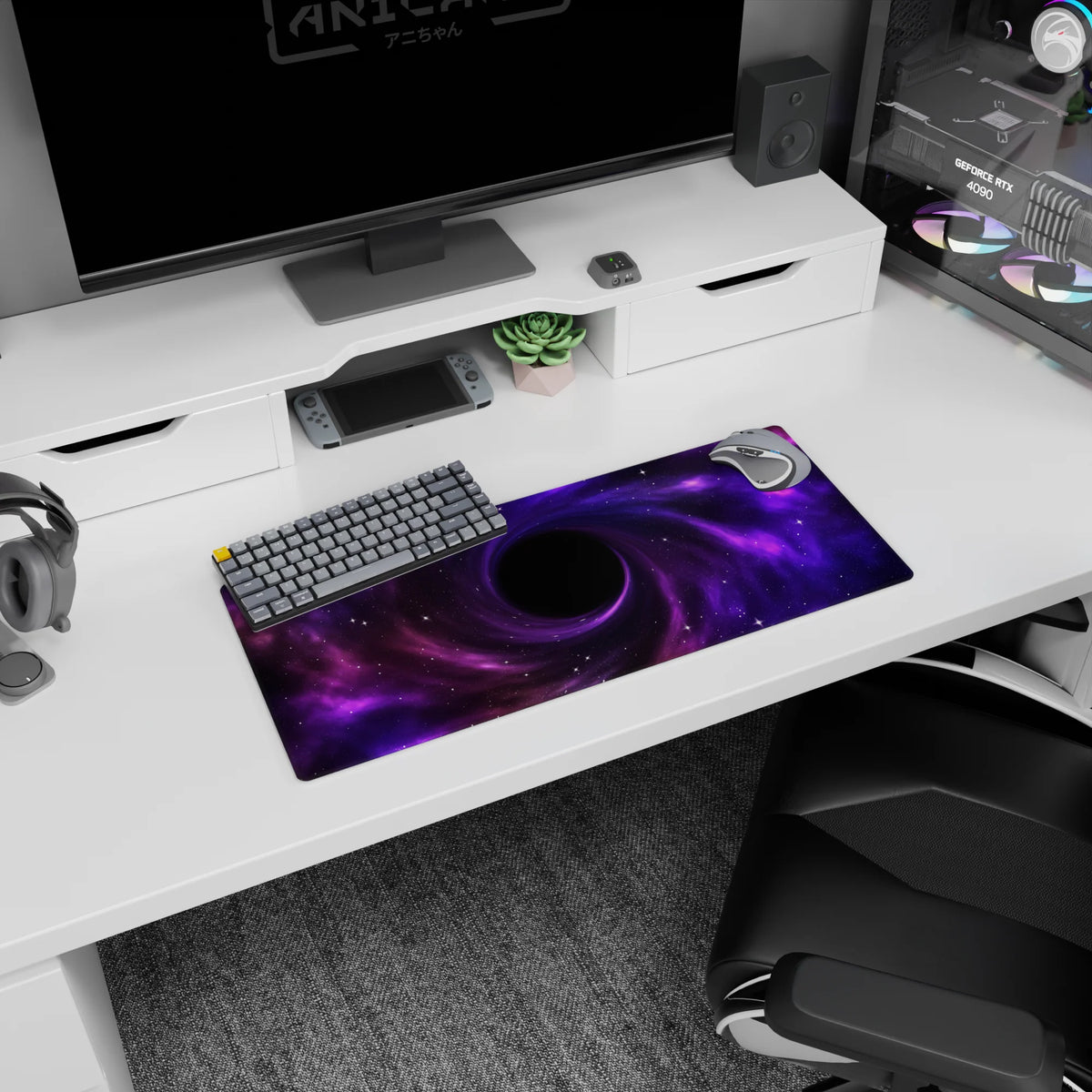 Spiraling violet clouds into a dark center with scattered stars on a mouse pad, 28x12 inches.