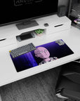 28x12 inches anime mouse pad featuring Saitama staring ahead, cape clasp detail, violet city mood behind him.