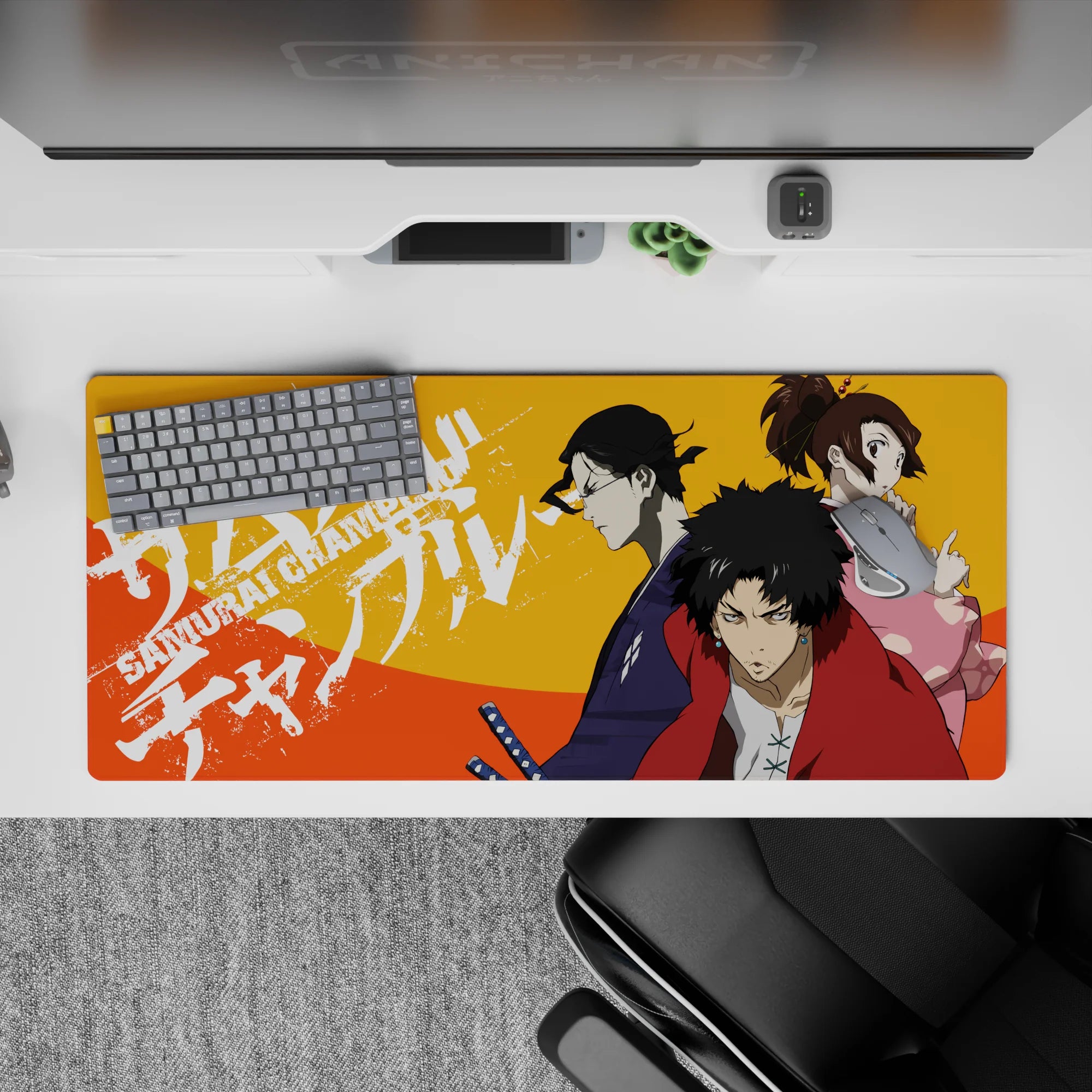 36x16 inches anime desk pad in bold orange heat with red, indigo, and pink street-poster energy.