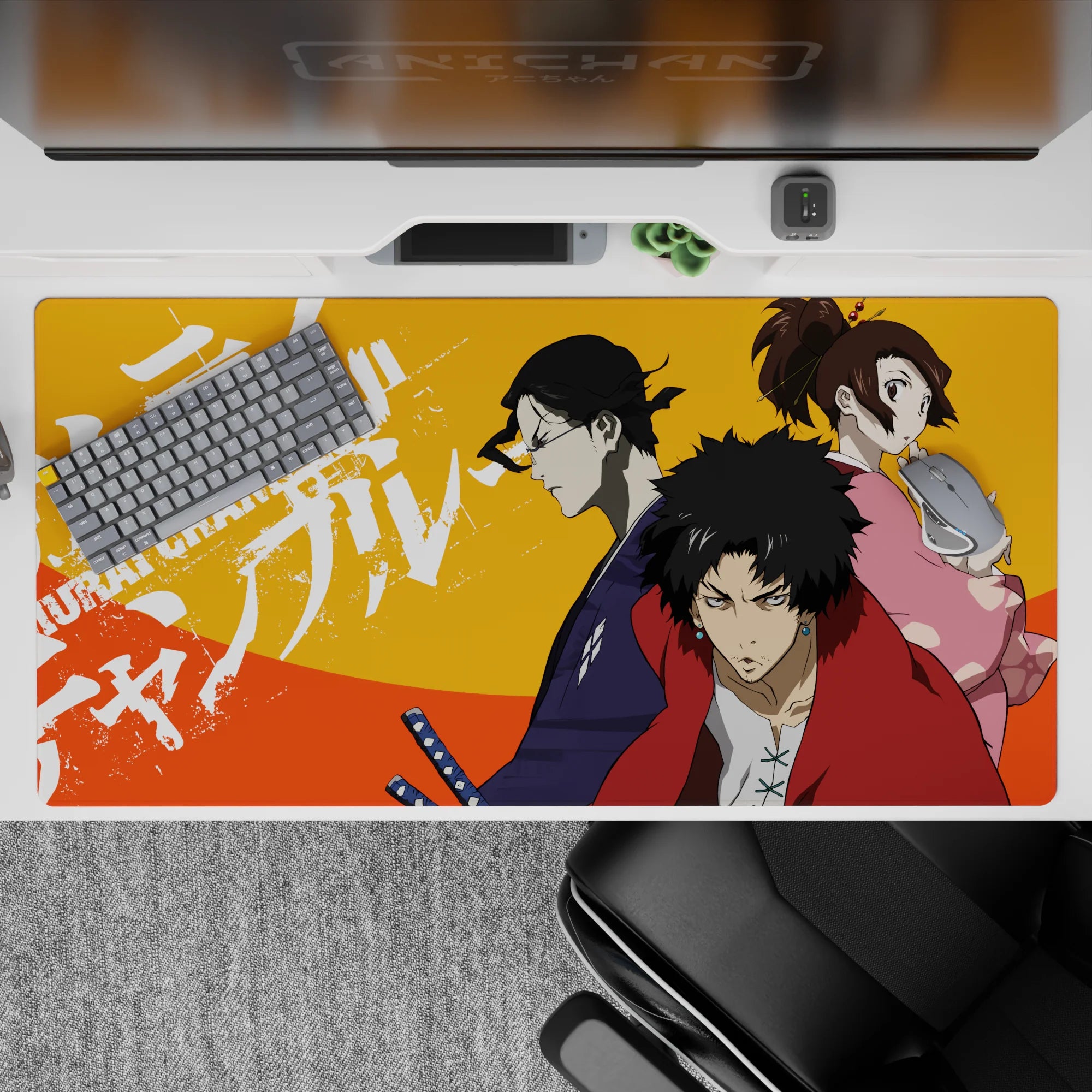 40x20 inches anime desk pad in bold orange heat with red, indigo, and pink characters, street-poster vibe.