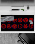 32x16 inches dark crimson Sharingan mouse pad with black tomoe and glowing blue rims, intense and sleek.