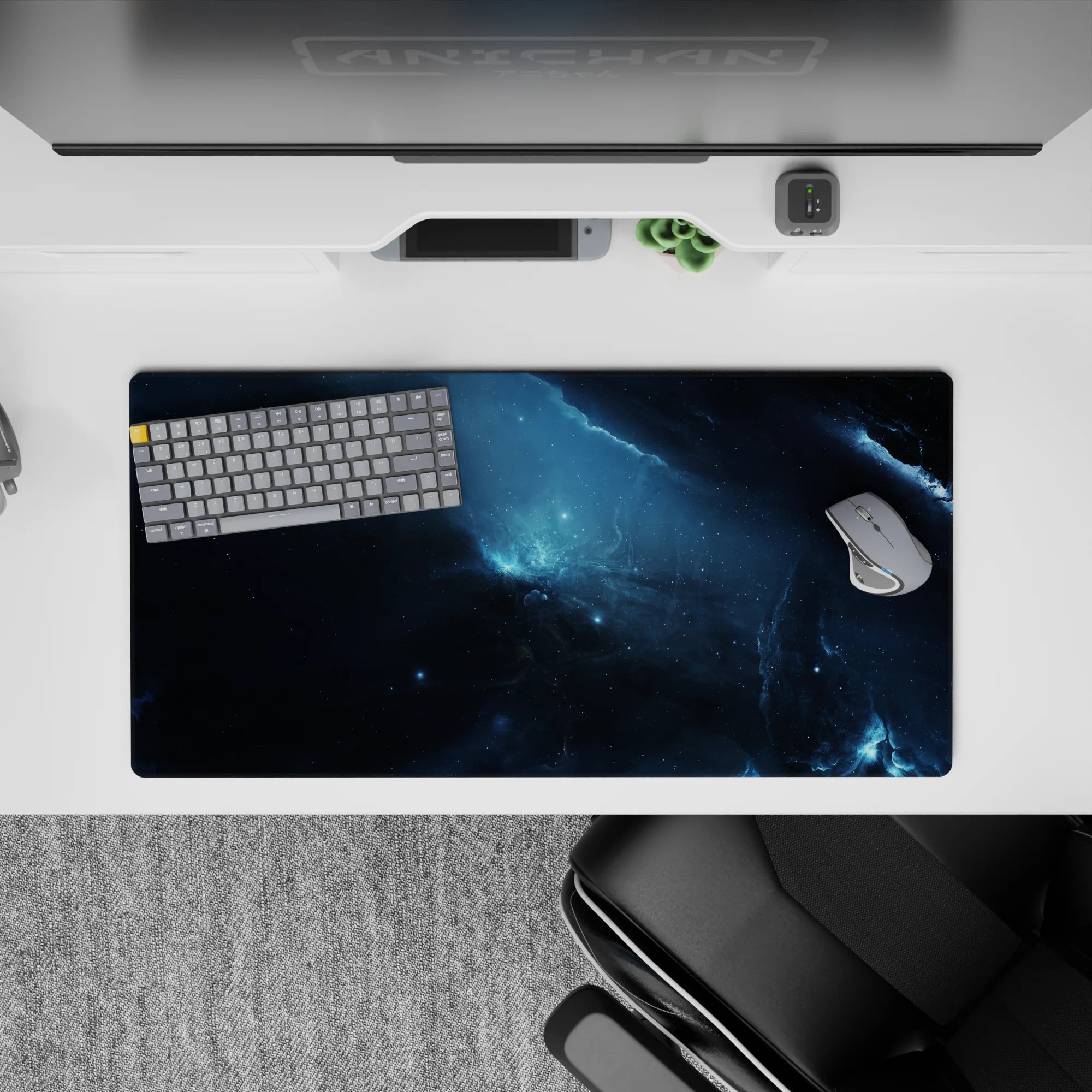 Calm yet wild 32x16 inches mouse pad in inky black and stormy blues with soft smoky haze and icy flashes.