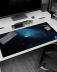 Starry space scene desk pad 40x20 inches featuring a deep nebula with twinkling specks and cloud swirls.
