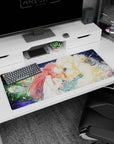 Red-haired girl in white dress leaning close to a glowing blond figure on anime desk pad 36x16 inches.