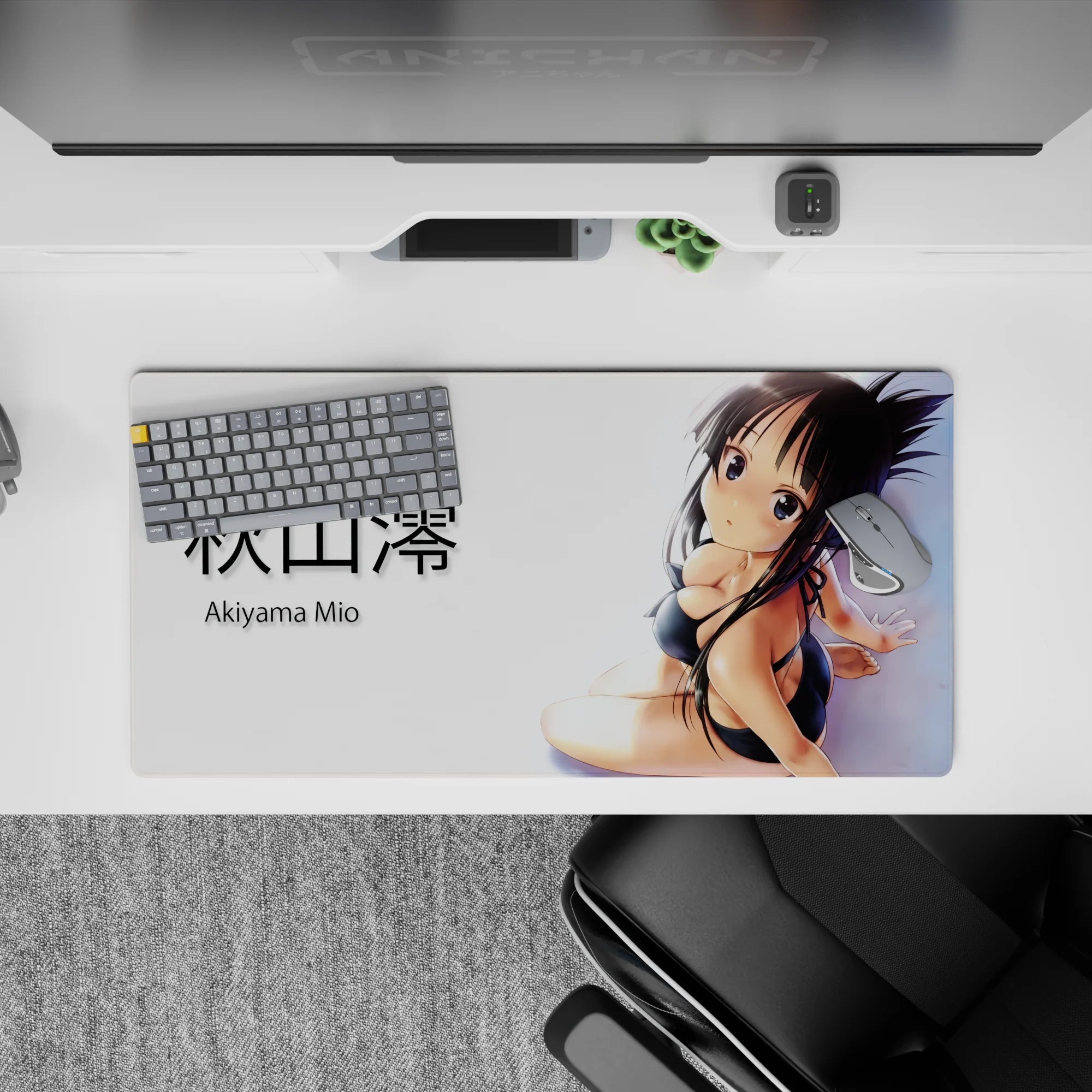 Soft glow skin highlights, dark hair, and flirty shy vibe anime desk mat in black and white, 32x16 inches.