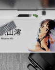 40x20 inches anime desk pad in black-and-white with soft glow highlights and a shy, flirty vibe.