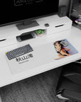 32x12 inches Akiyama Mio anime mouse pad, seated in black bikini, over-shoulder glance, ribboned hair.