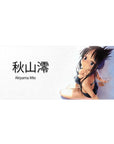 36x16 inches anime girl desk pad with glossy black bikini pose, kanji text, white background, long dark hair.