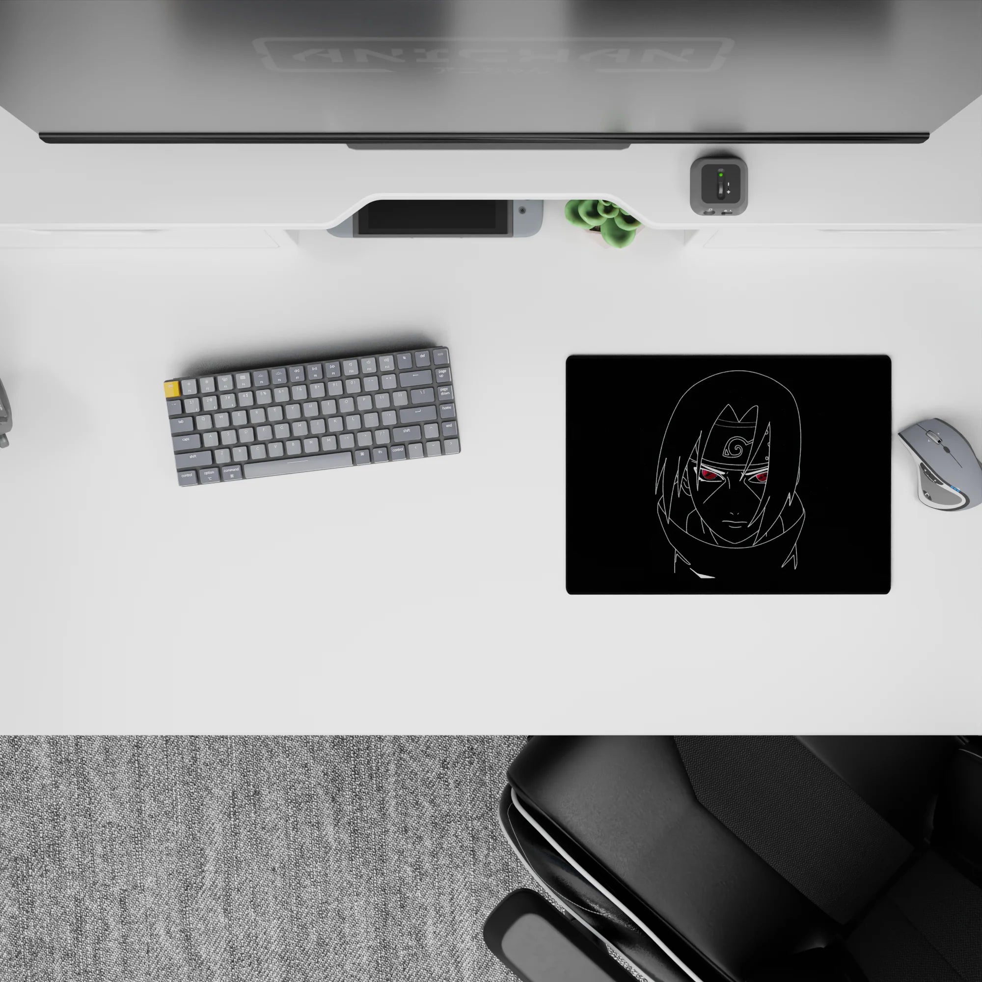 Black-and-red anime mouse pad 14x10 inches with neon Sharingan pop, calm before the storm vibe.