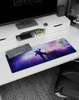 Star-sprinkled nebula cloudscape mouse pad 32x12 inches with floating dust across a cosmic sky.