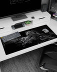 36x16 inches anime desk pad showing a lone helmeted swordsman gripping a blade, cutting through darkness.
