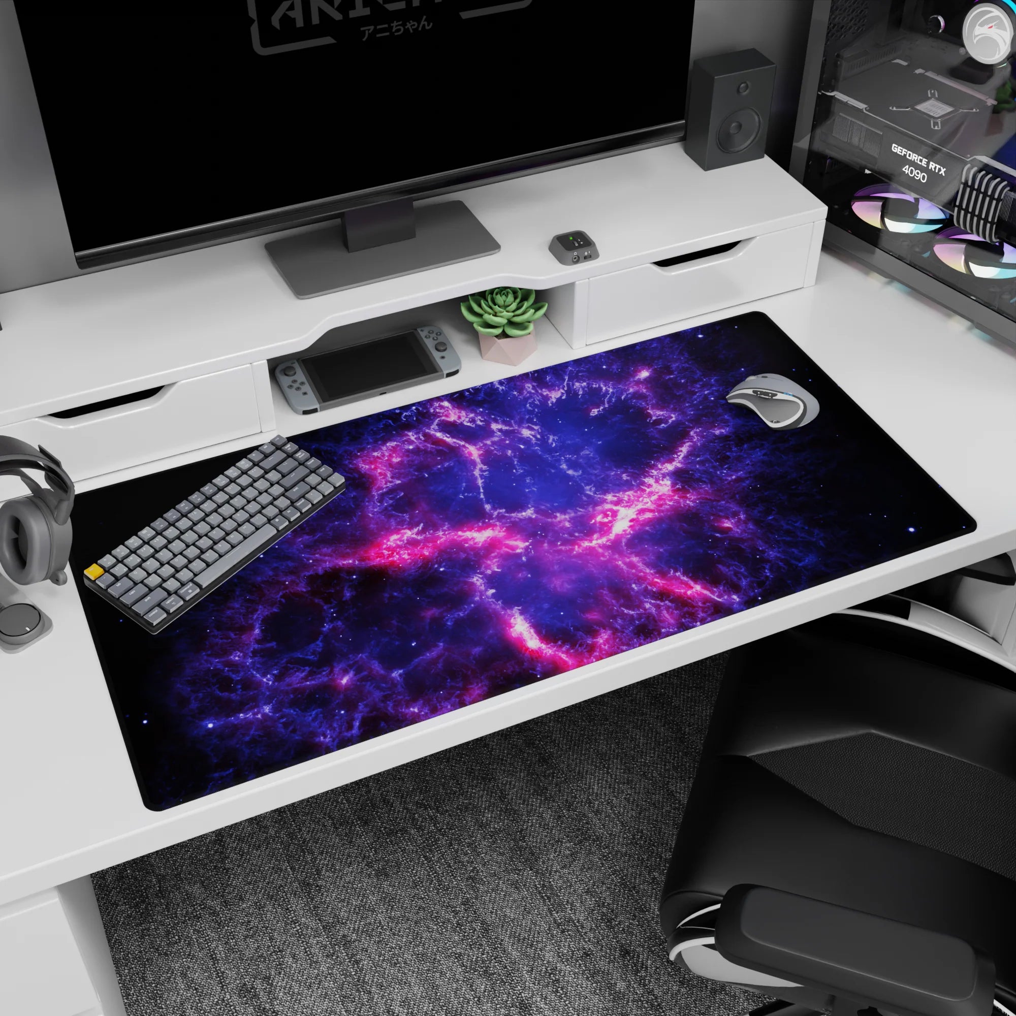 Stardust graffiti desk pad 40x20 inches with neon pink rivers cracking across a deep space sky.