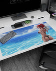 Red-haired anime girl looking back in black bikini on ocean water desk pad 40x20 inches.
