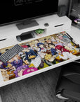 40x20 inches anime desk pad showing chefs and students crowding steaming plates at a wood table.