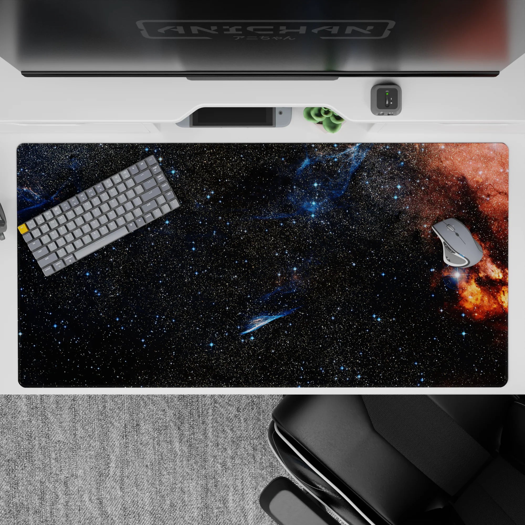 Moody deep inky space desk pad 40x20 inches with warm fiery nebula edge and calming cosmic vibe.