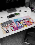 Cheeky anime girls lineup on desk pad 36x16 inches, colorful backdrop and sweet cel-shaded look.