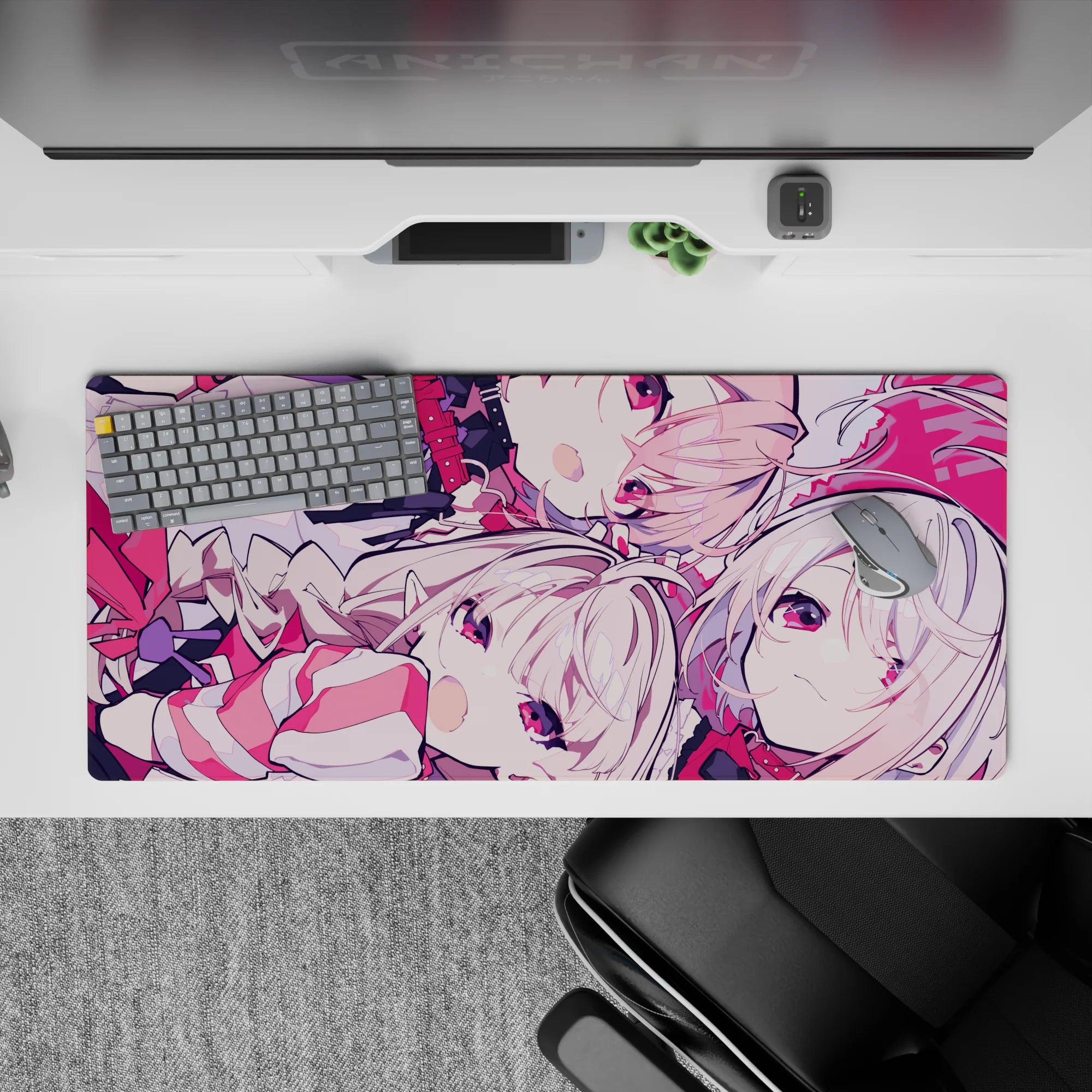 Pink-and-crimson anime desk pad 36x16 inches, playful best-friends chaos vibe, sweet contrast.