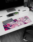 32x12 inches anime girl mouse pad showing a winking pale-haired girl with ruby eyes and candy-like ribbon accents.