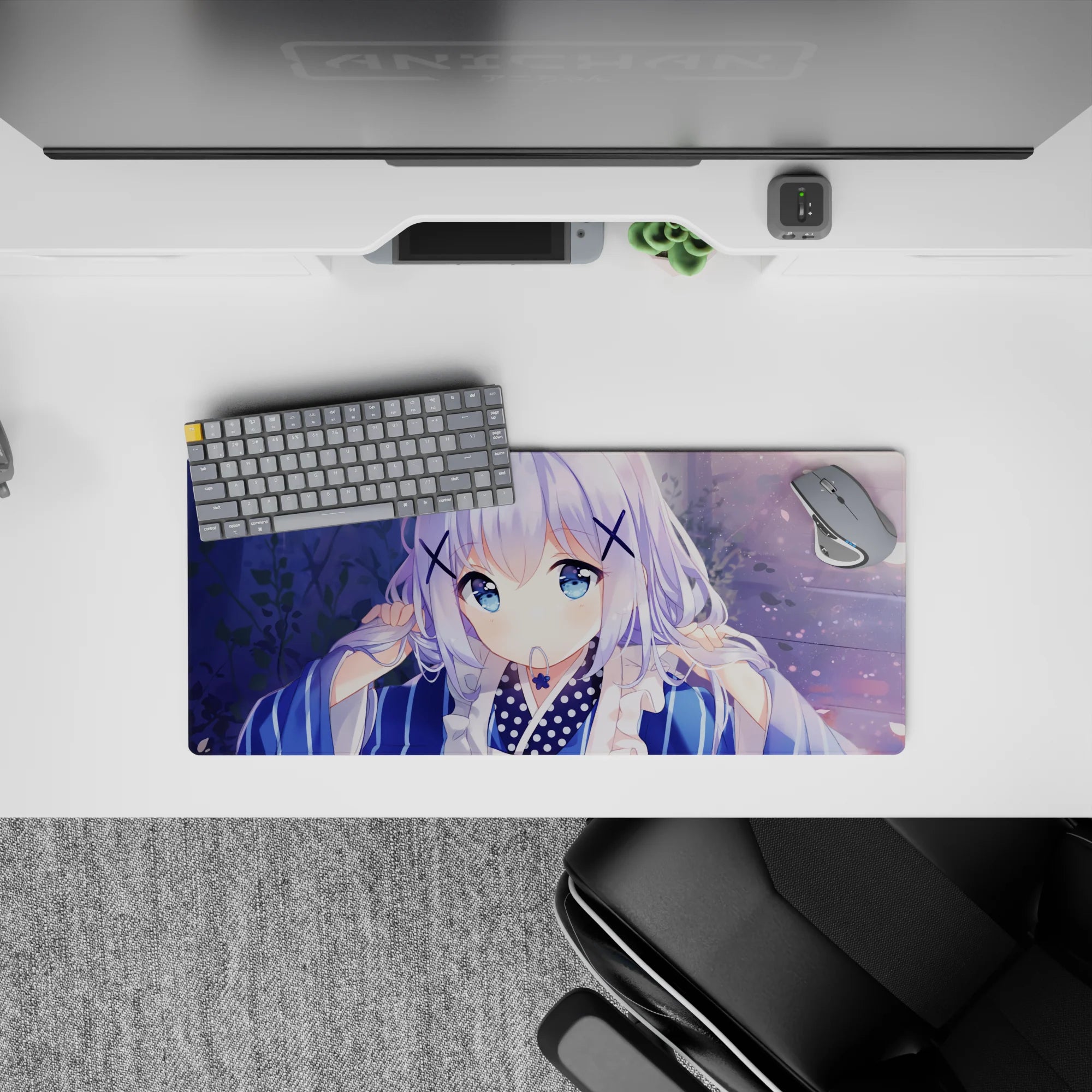 28x12 inches pastel desk mat in soft blue and lilac, cozy dreamy vibe with sparkly bokeh and petals.