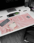 Desk pad featuring Zero Two from Darling in the Franxx, 40x20 inches, with soft pastel tones and a subtle pink background.
