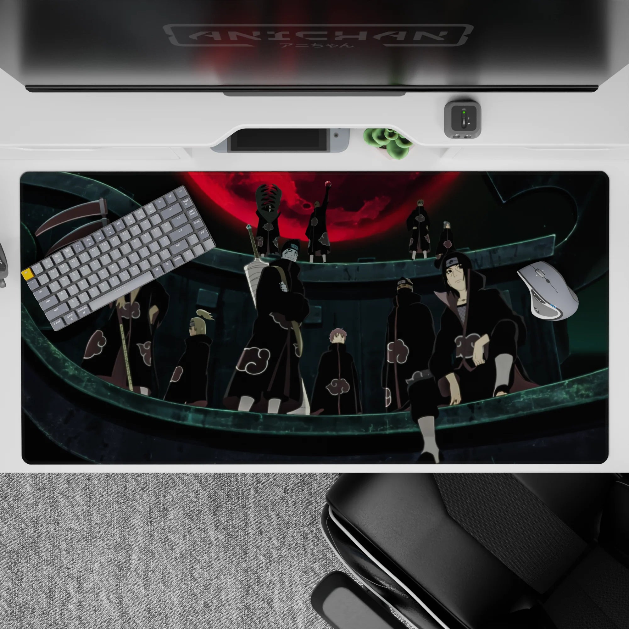 Black and red anime desk pad 40x20 inches, moody Akatsuki vibe with bold crimson moon for gaming.