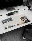 Big-eyed anime girl glancing back with pencil and mint scrunchie, silver headphones mouse pad 32x16 inches.