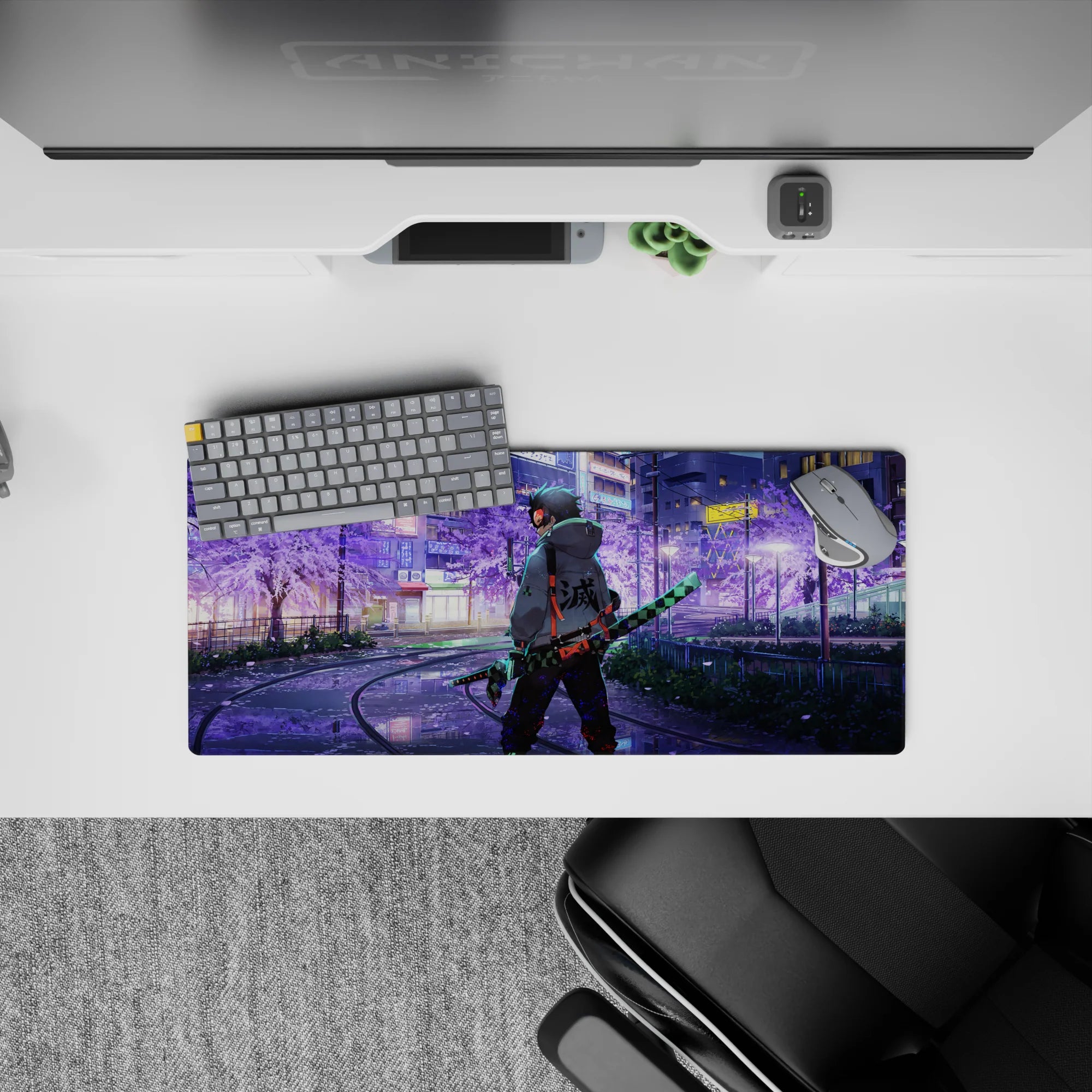 Tanjiro walks in neon-lit city with sakura tones, iconic blade ready. Anime mouse pad size 28x12 inches.