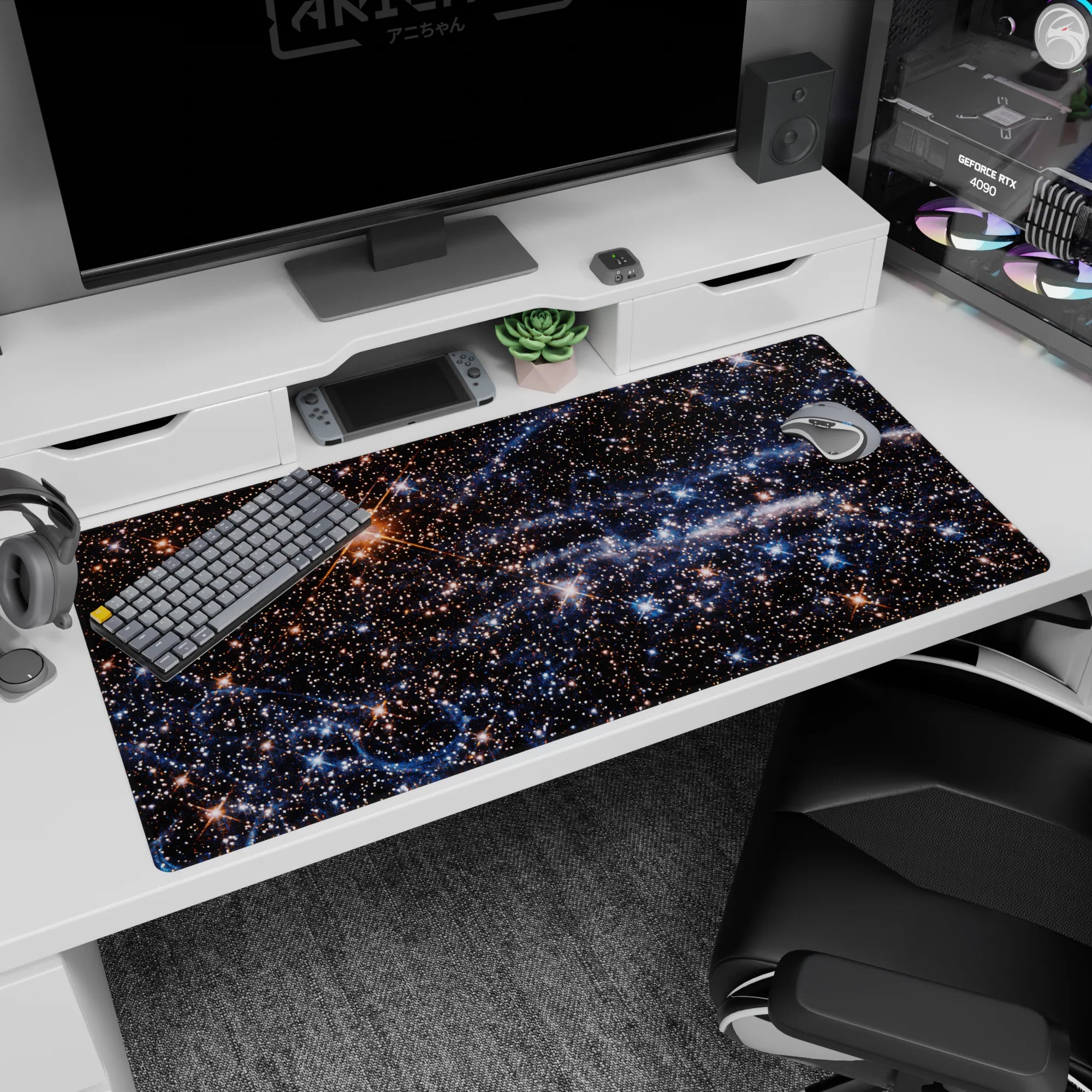 Twinkling gold stars and cloudy nebula streaks desk pad 40x20 inches like a tiny space scene.