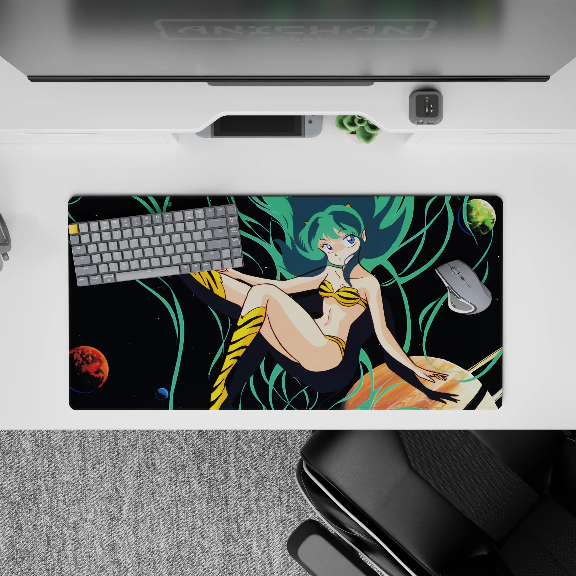 32x16 inches neon teal and deep-black space mouse pad, playful galaxy vibe with sea-green hair accents.