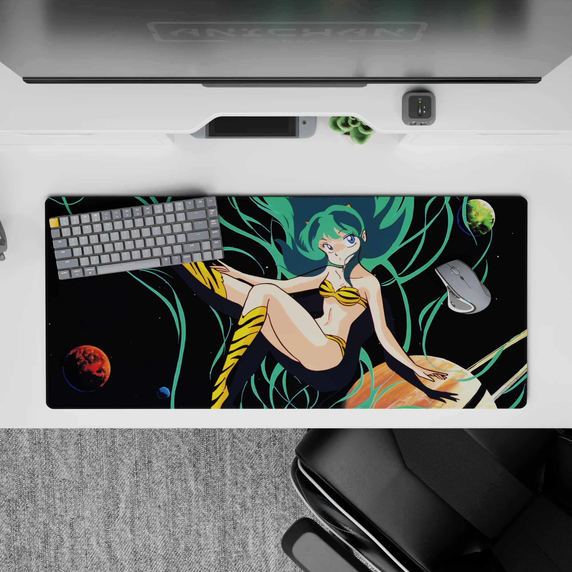 Neon teal and deep-space black 36x16 inches anime desk pad, playful starry vibe with yellow accents.