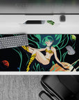 Neon teal and deep-space black 36x16 inches anime desk pad, playful starry vibe with yellow accents.