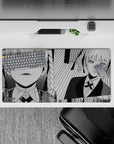 Bold black-and-white shading anime desk mat with cool smirking vibe, striped backdrop, 32x16 inches.