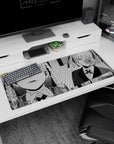 36x16 inches anime desk pad showing sharp-eyed girl in braids, close-up panel plus full pose smirk.