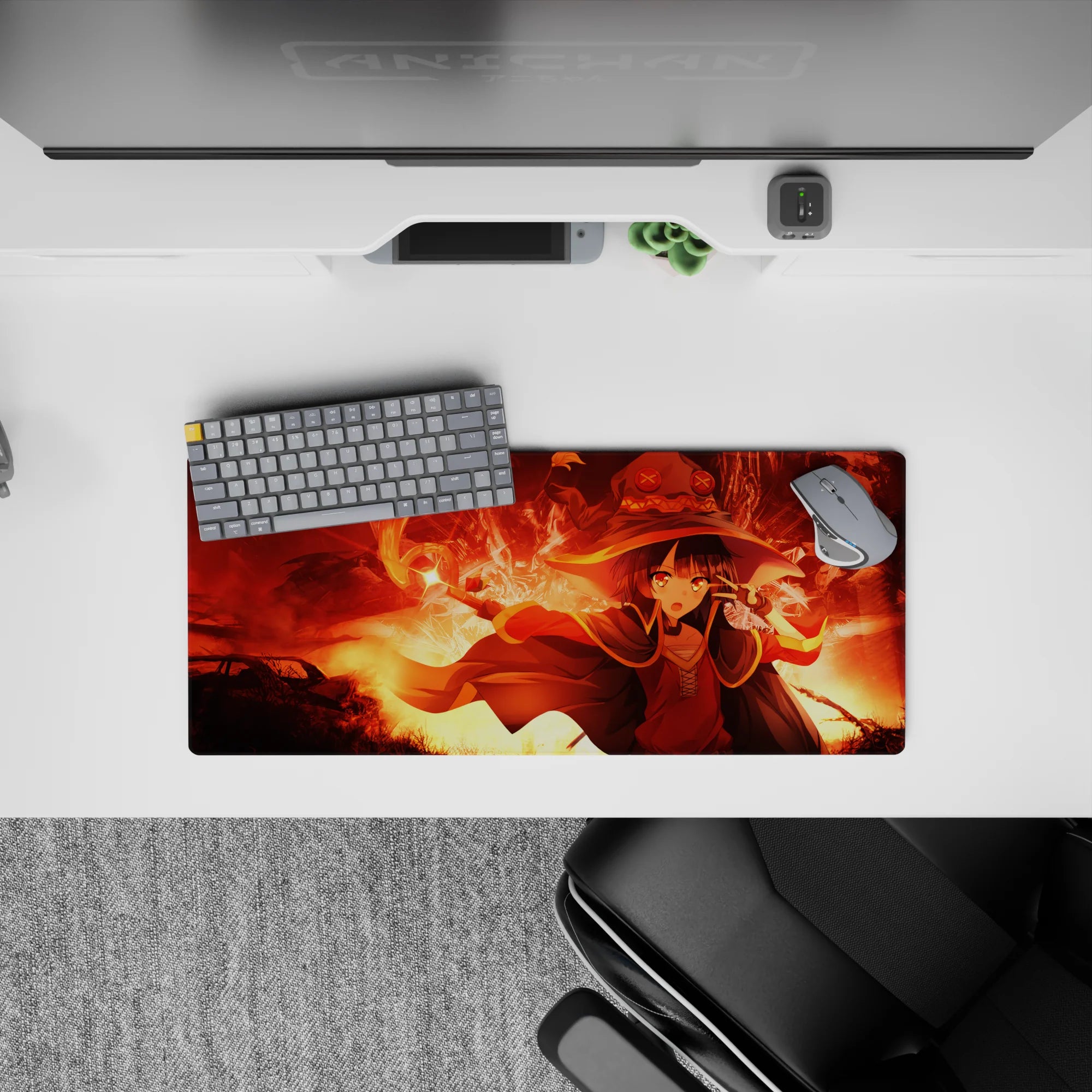 Megumin from KonoSuba unleashes magic on a 28x12 inch anime mouse pad, featuring fiery reds and glowing golds.