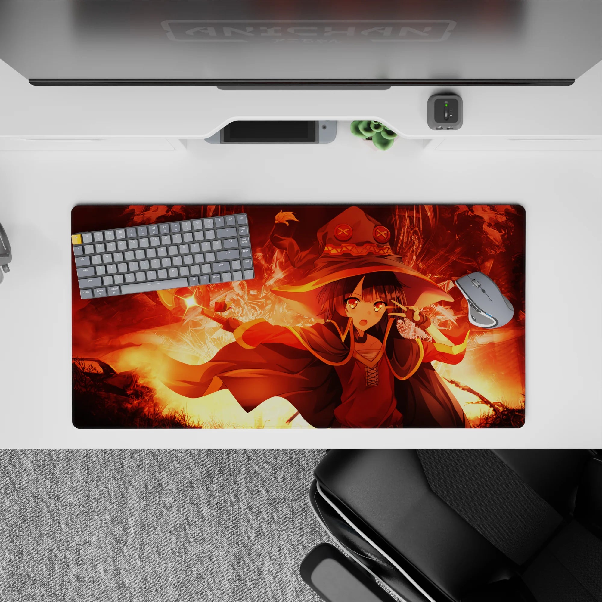 Megumin from KonoSuba unleashing her explosion magic, mouse pad 32x16 inches, vibrant reds and golds, magic pose.
