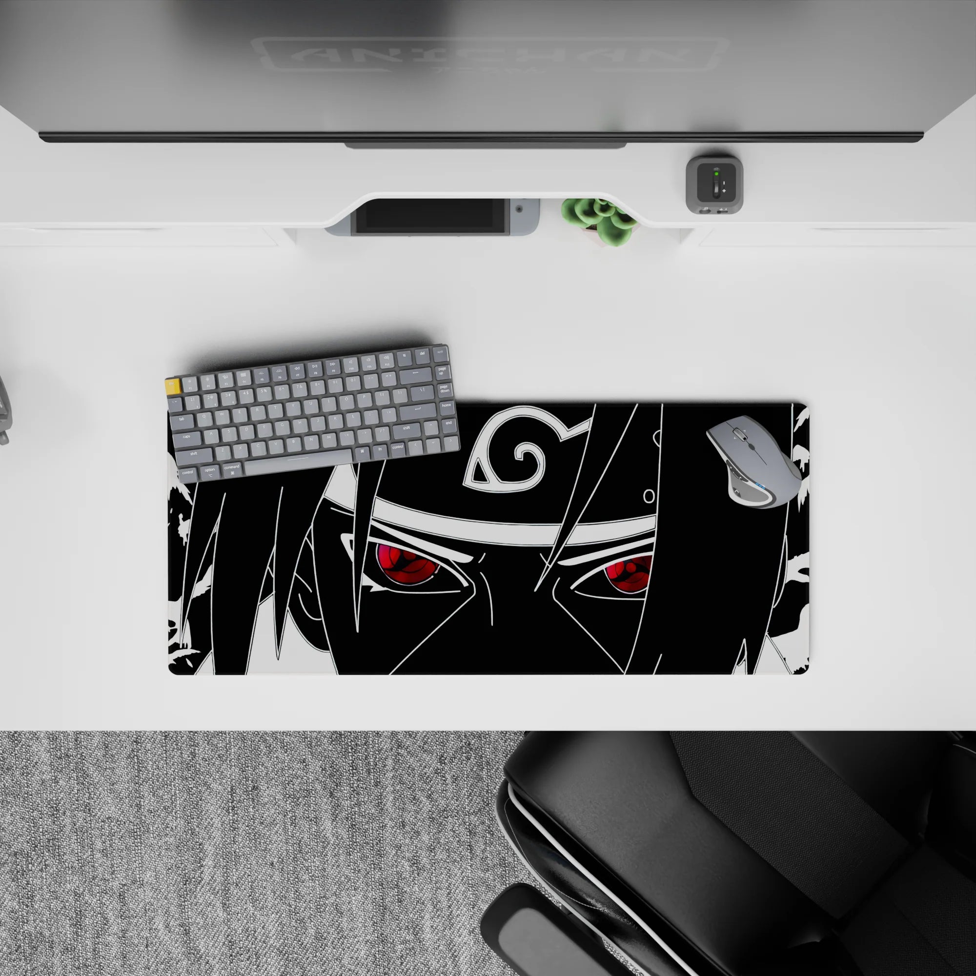 28x12 inches anime mouse pad in sharp monochrome with a bold crimson Sharingan for an intense mood.