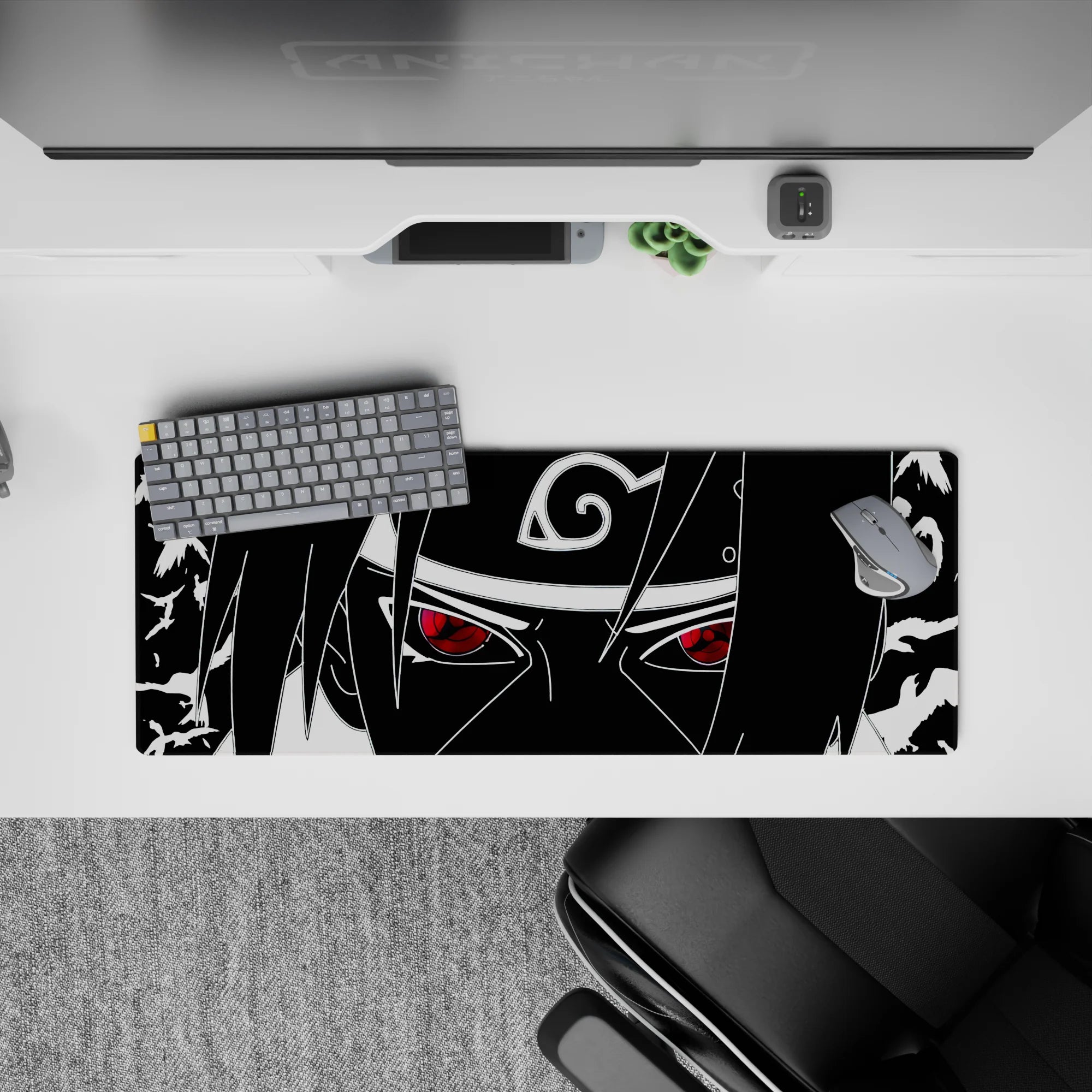 32x12 inches black-and-white anime mouse pad with a crimson Sharingan pop and moody, sharp stare vibe.