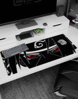 36x16 inches Naruto Sasuke Uchiha desk pad featuring his piercing stare and iconic Leaf headband.